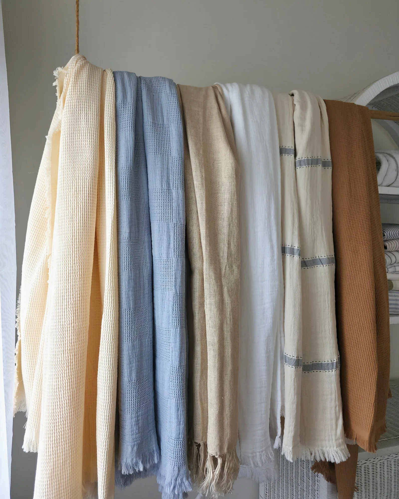 Throws – six throws hung on a rail
