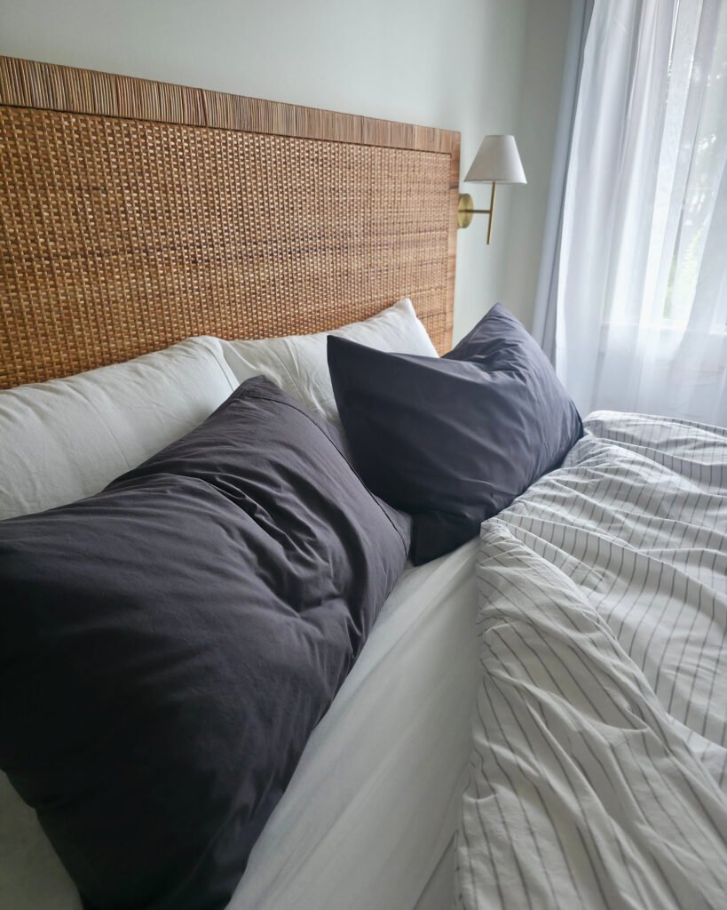 Pin stripe black cover, steel pillowcases, angled (lifestyle)